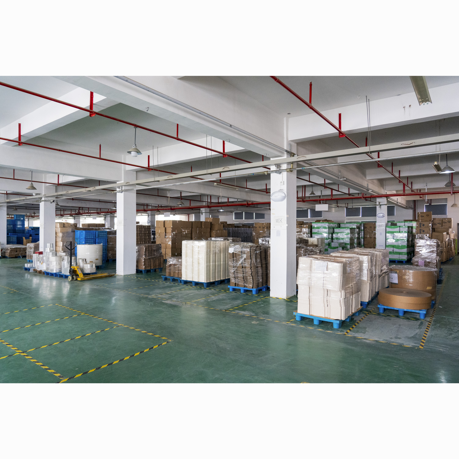 Organized warehouse with packaged food packaging goods on pallets